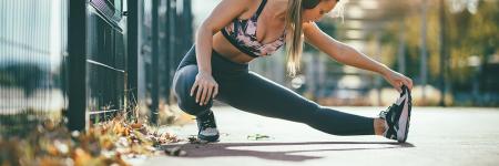 Girl stretching before a run